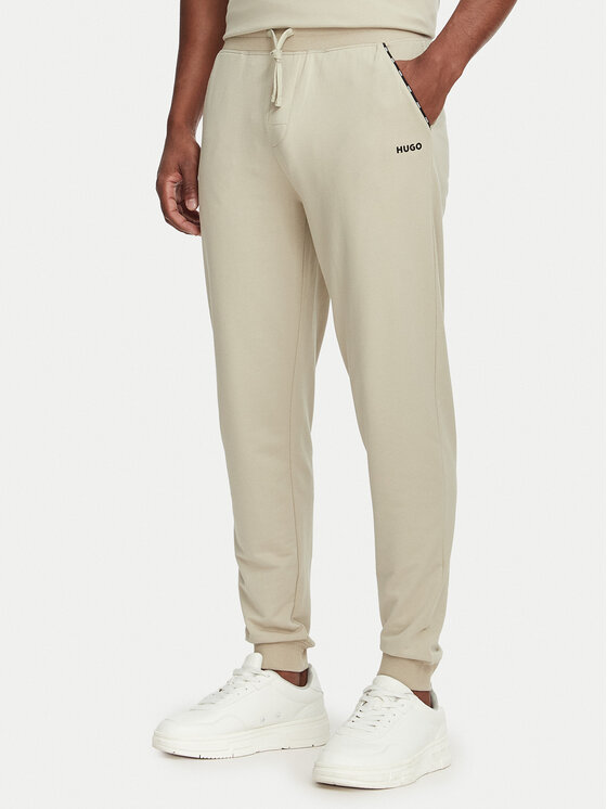 HUGO Spodnie dresowe Noah 50566158 Beżowy Regular Fit