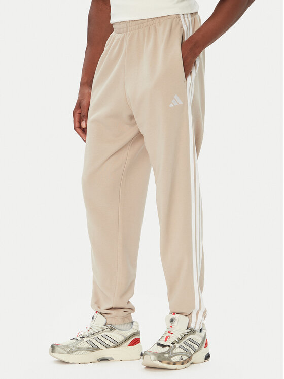 adidas Spodnie dresowe Essentials 3-Stripes French Terry Tapered Cuffed KY4196 Beżowy Regular Fit