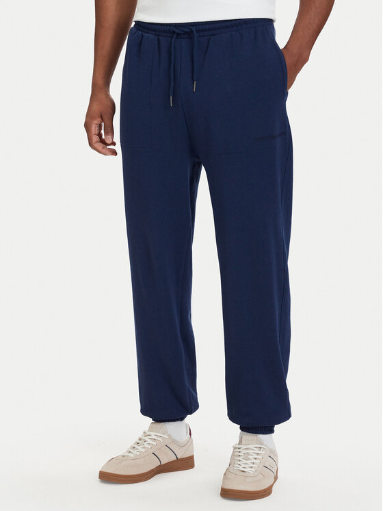 Tommy Hilfiger Spodnie dresowe Essential UM0UM03911 Granatowy Relaxed Fit