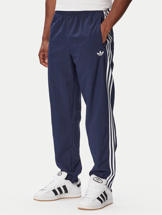 adidas Spodnie dresowe Firebird Woven KE1370 Granatowy Regular Fit