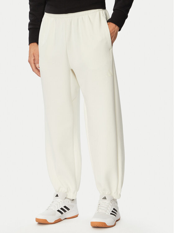 adidas Spodnie dresowe Soft Lux KF8574 Kremowy Regular Fit