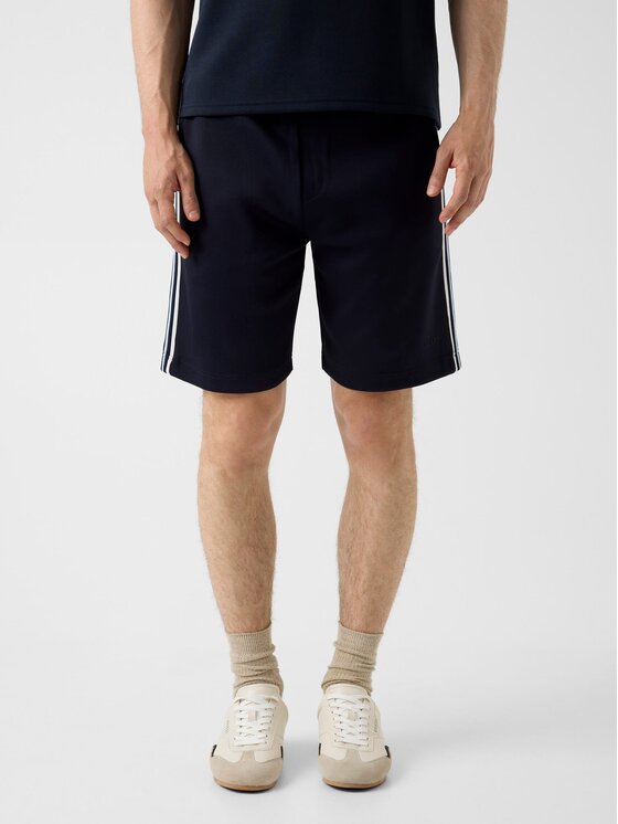 Guess Spodnie materiałowe 183578 Niebieski Bermuda Fit
