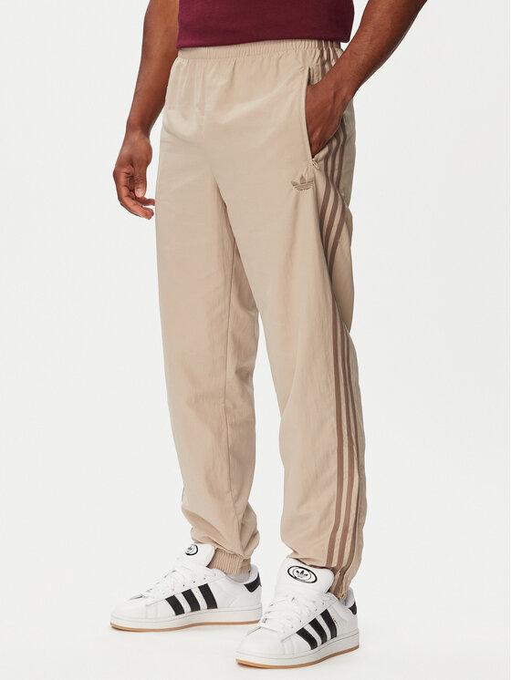 adidas Spodnie dresowe Firebird KS7503 Beżowy Regular Fit