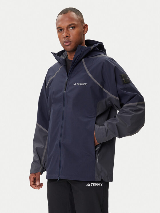 adidas Kurtka przeciwdeszczowa Nat Geo Climaproof KC2343 Granatowy Loose Fit