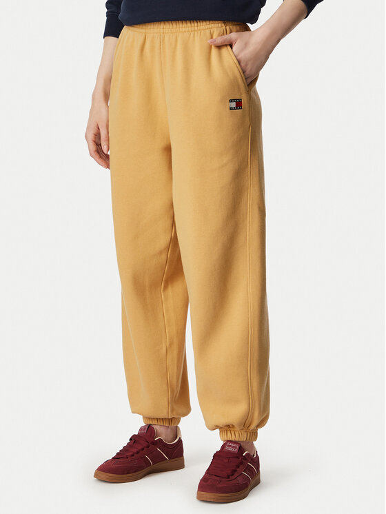 Tommy Jeans Spodnie dresowe Badge DW0DW23536 Beżowy Regular Fit