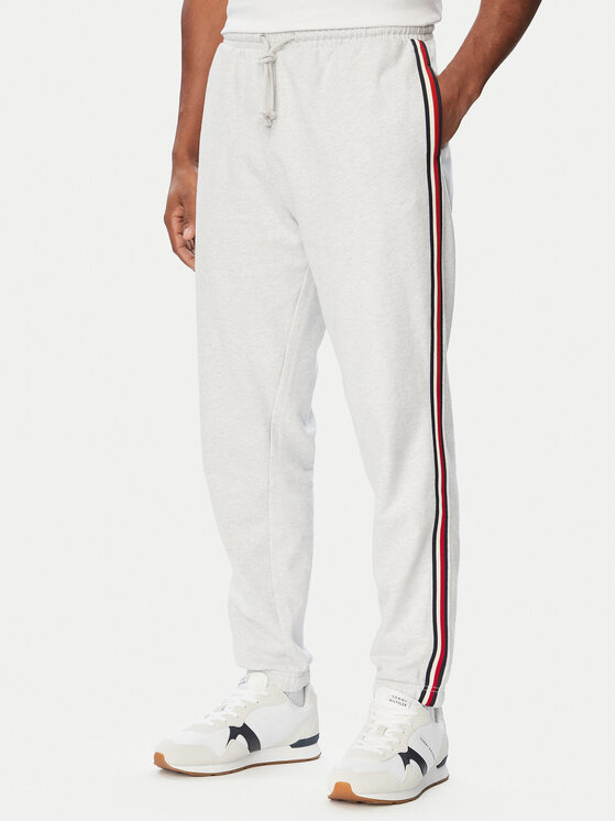 Tommy Hilfiger Spodnie dresowe UM0UM03944 Szary jasny Regular Fit