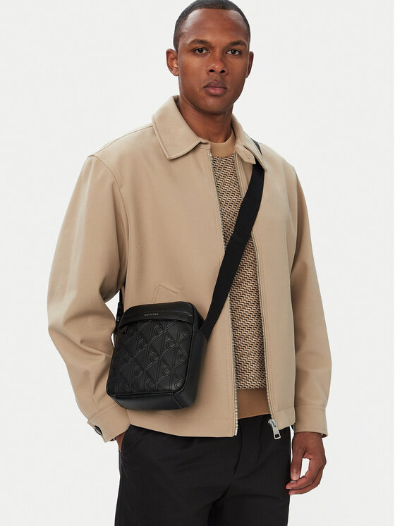 Calvin Klein Saszetka Emblem Aop Deboss Reporter LV04D3562G Czarny