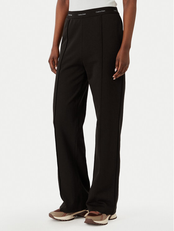 Calvin Klein Jeans Spodnie dresowe LV047G253G Brązowy ciemny Relaxed Fit